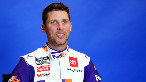 NASCAR Cup Series driver Denny Hamlin (11) talks with the press during media day at Daytona International Speedway.